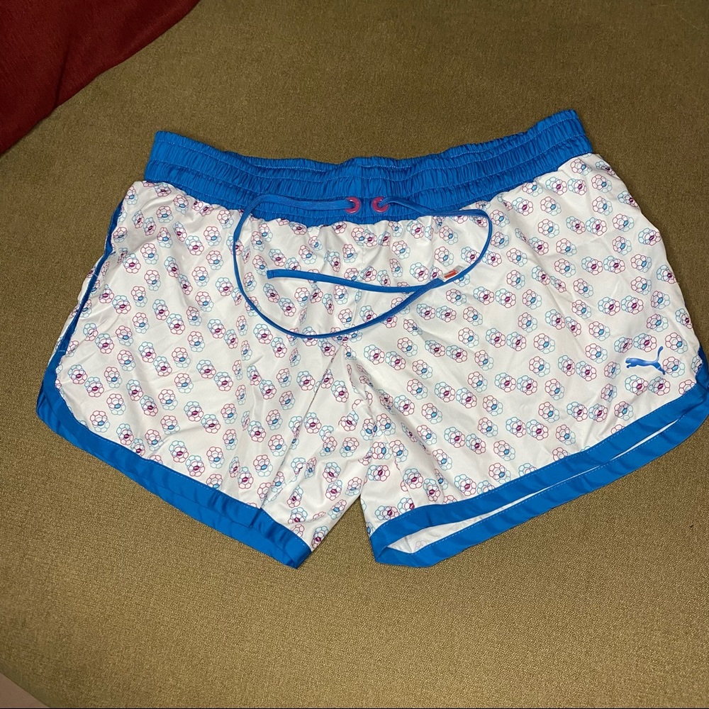 PUMA blue, white and pink athletic running shorts. Women’s size Large